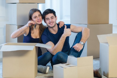 Professional team preparing office equipment for relocation